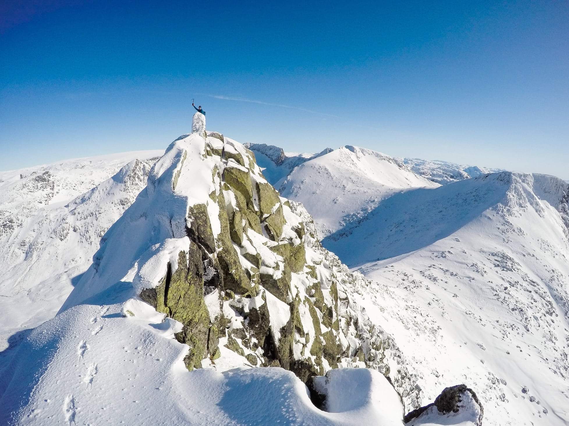 A man on a snowy mountain