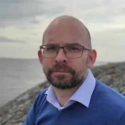 A man wearing glasses