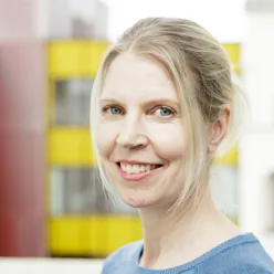 A close-up of a woman smiling