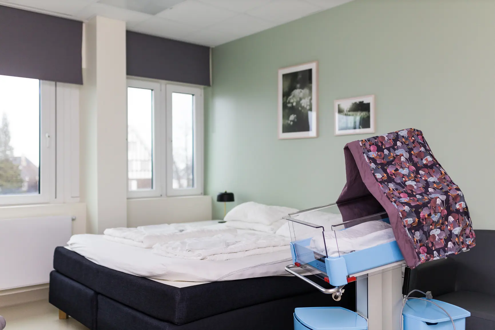 A bedroom with a bed and a couch